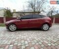 Красный Форд Фокус, объемом двигателя 2 л и пробегом 250 тыс. км за 9300 $, фото 1 на Automoto.ua