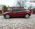Красный Форд Фокус, объемом двигателя 2 л и пробегом 250 тыс. км за 9300 $, фото 1 на Automoto.ua