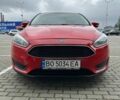 Червоний Форд Фокус, об'ємом двигуна 2 л та пробігом 156 тис. км за 9444 $, фото 3 на Automoto.ua