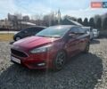 Красный Форд Фокус, объемом двигателя 2 л и пробегом 128 тыс. км за 9800 $, фото 1 на Automoto.ua