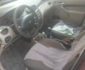 Красный Форд Фокус, объемом двигателя 1.6 л и пробегом 266 тыс. км за 1700 $, фото 2 на Automoto.ua