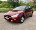 Красный Форд Фокус, объемом двигателя 1.6 л и пробегом 219 тыс. км за 2750 $, фото 1 на Automoto.ua