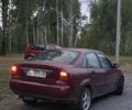Красный Форд Фокус, объемом двигателя 1.8 л и пробегом 200 тыс. км за 1300 $, фото 3 на Automoto.ua