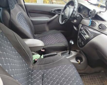 Красный Форд Фокус, объемом двигателя 2.02 л и пробегом 295 тыс. км за 2500 $, фото 3 на Automoto.ua