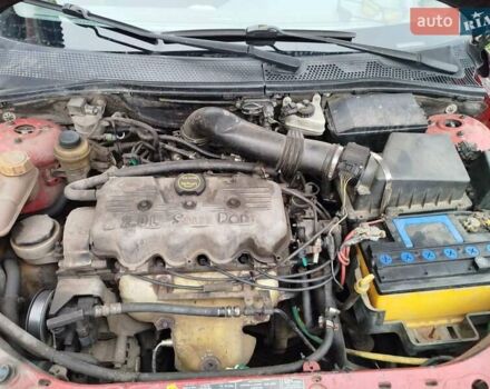 Красный Форд Фокус, объемом двигателя 2.02 л и пробегом 295 тыс. км за 2500 $, фото 10 на Automoto.ua