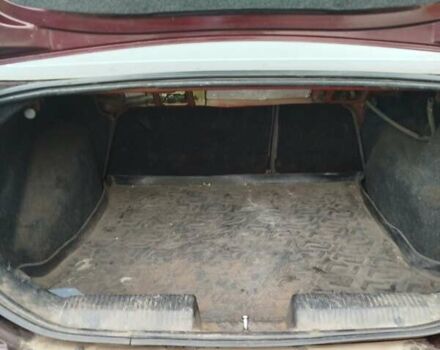 Красный Форд Фокус, объемом двигателя 2.02 л и пробегом 295 тыс. км за 2500 $, фото 1 на Automoto.ua