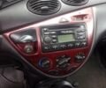 Красный Форд Фокус, объемом двигателя 1.6 л и пробегом 346 тыс. км за 2550 $, фото 1 на Automoto.ua