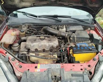 Красный Форд Фокус, объемом двигателя 2.02 л и пробегом 295 тыс. км за 2500 $, фото 7 на Automoto.ua