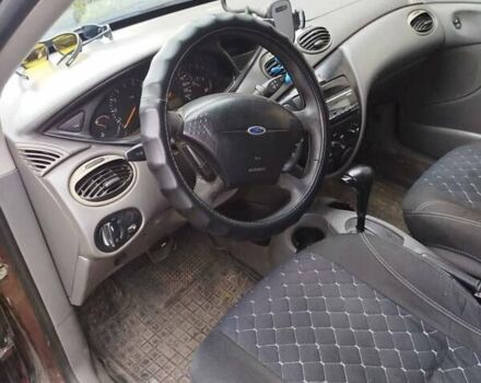 Красный Форд Фокус, объемом двигателя 2.02 л и пробегом 295 тыс. км за 2500 $, фото 8 на Automoto.ua