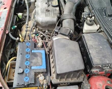 Красный Форд Фокус, объемом двигателя 2.02 л и пробегом 295 тыс. км за 2500 $, фото 11 на Automoto.ua