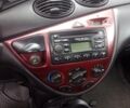 Красный Форд Фокус, объемом двигателя 1.6 л и пробегом 346 тыс. км за 2550 $, фото 1 на Automoto.ua