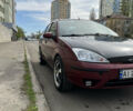 Красный Форд Фокус, объемом двигателя 1.8 л и пробегом 250 тыс. км за 2999 $, фото 2 на Automoto.ua