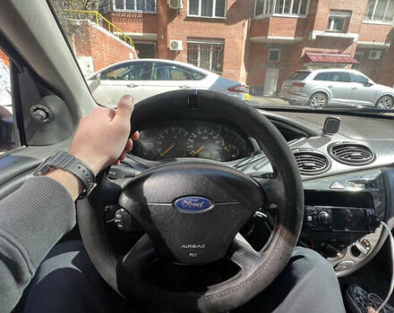 Красный Форд Фокус, объемом двигателя 1.8 л и пробегом 250 тыс. км за 2999 $, фото 11 на Automoto.ua