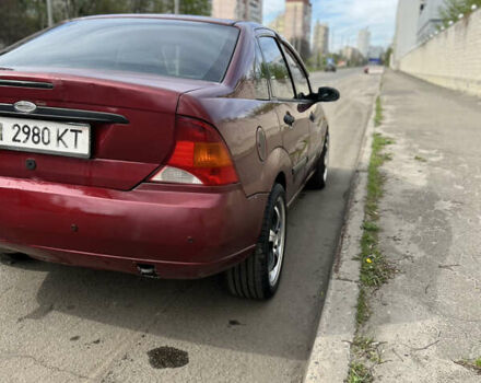 Красный Форд Фокус, объемом двигателя 1.8 л и пробегом 250 тыс. км за 2999 $, фото 4 на Automoto.ua