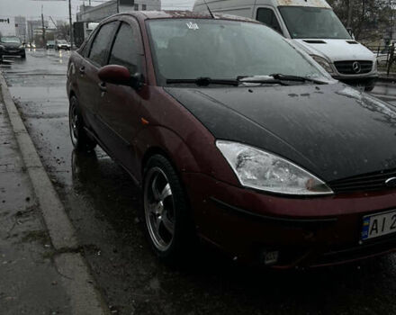 Красный Форд Фокус, объемом двигателя 1.8 л и пробегом 250 тыс. км за 2999 $, фото 8 на Automoto.ua