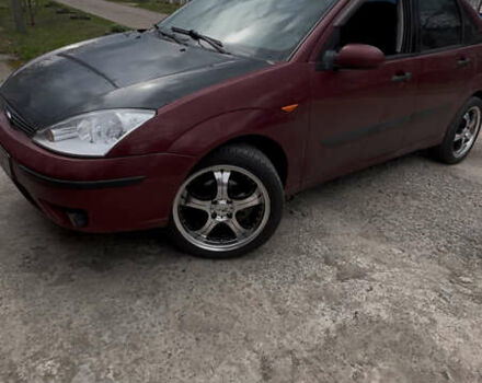 Красный Форд Фокус, объемом двигателя 1.8 л и пробегом 250 тыс. км за 2999 $, фото 3 на Automoto.ua