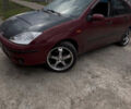 Красный Форд Фокус, объемом двигателя 1.8 л и пробегом 250 тыс. км за 2999 $, фото 3 на Automoto.ua