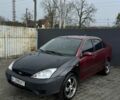 Червоний Форд Фокус, об'ємом двигуна 1.8 л та пробігом 250 тис. км за 2600 $, фото 1 на Automoto.ua