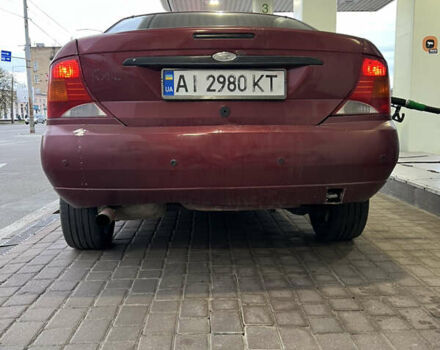Красный Форд Фокус, объемом двигателя 1.8 л и пробегом 250 тыс. км за 2999 $, фото 7 на Automoto.ua
