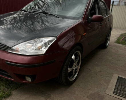 Красный Форд Фокус, объемом двигателя 1.8 л и пробегом 250 тыс. км за 2999 $, фото 9 на Automoto.ua