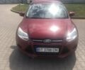 Красный Форд Фокус, объемом двигателя 2 л и пробегом 160 тыс. км за 6700 $, фото 2 на Automoto.ua