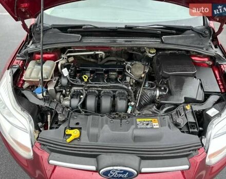 Красный Форд Фокус, объемом двигателя 2 л и пробегом 160 тыс. км за 6450 $, фото 12 на Automoto.ua
