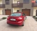 Красный Форд Фокус, объемом двигателя 2 л и пробегом 150 тыс. км за 8000 $, фото 1 на Automoto.ua