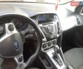 Красный Форд Фокус, объемом двигателя 2 л и пробегом 150 тыс. км за 8000 $, фото 2 на Automoto.ua