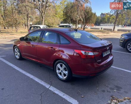 Красный Форд Фокус, объемом двигателя 2 л и пробегом 130 тыс. км за 6800 $, фото 4 на Automoto.ua