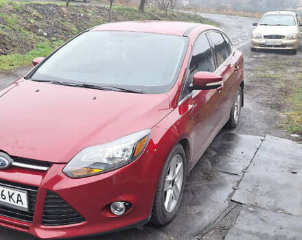 Красный Форд Фокус, объемом двигателя 2 л и пробегом 130 тыс. км за 9300 $, фото 1 на Automoto.ua