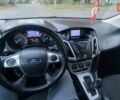 Красный Форд Фокус, объемом двигателя 2 л и пробегом 150 тыс. км за 8000 $, фото 3 на Automoto.ua