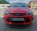 Красный Форд Фокус, объемом двигателя 2 л и пробегом 100 тыс. км за 7700 $, фото 1 на Automoto.ua