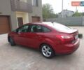 Красный Форд Фокус, объемом двигателя 2 л и пробегом 150 тыс. км за 8000 $, фото 1 на Automoto.ua