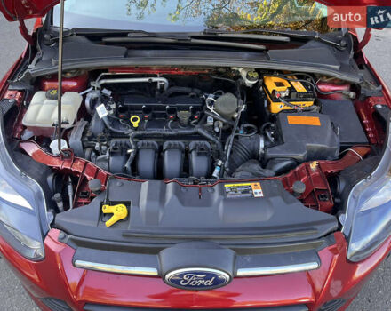 Красный Форд Фокус, объемом двигателя 2 л и пробегом 130 тыс. км за 6800 $, фото 14 на Automoto.ua