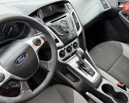 Червоний Форд Фокус, об'ємом двигуна 2 л та пробігом 139 тис. км за 8159 $, фото 12 на Automoto.ua