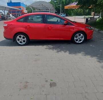 Красный Форд Фокус, объемом двигателя 2 л и пробегом 100 тыс. км за 7700 $, фото 2 на Automoto.ua