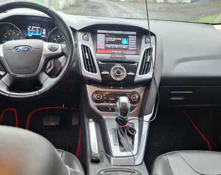 Красный Форд Фокус, объемом двигателя 2 л и пробегом 130 тыс. км за 9300 $, фото 13 на Automoto.ua