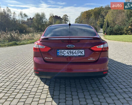 Червоний Форд Фокус, об'ємом двигуна 2 л та пробігом 165 тис. км за 7100 $, фото 14 на Automoto.ua