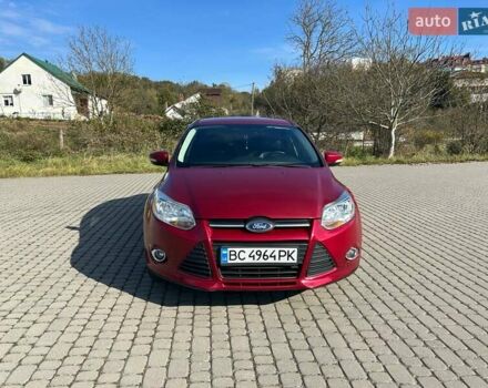 Червоний Форд Фокус, об'ємом двигуна 2 л та пробігом 165 тис. км за 7100 $, фото 1 на Automoto.ua