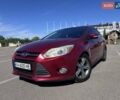 Красный Форд Фокус, объемом двигателя 2 л и пробегом 139 тыс. км за 6800 $, фото 1 на Automoto.ua