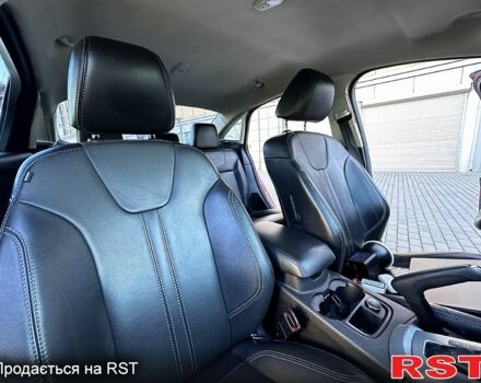 Червоний Форд Фокус, об'ємом двигуна 2 л та пробігом 204 тис. км за 7049 $, фото 3 на Automoto.ua