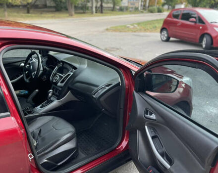 Красный Форд Фокус, объемом двигателя 2 л и пробегом 206 тыс. км за 6500 $, фото 7 на Automoto.ua