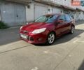 Красный Форд Фокус, объемом двигателя 2 л и пробегом 124 тыс. км за 6800 $, фото 1 на Automoto.ua