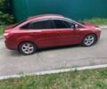 Красный Форд Фокус, объемом двигателя 2 л и пробегом 90 тыс. км за 8600 $, фото 1 на Automoto.ua