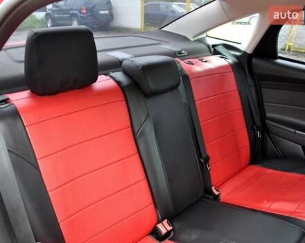 Червоний Форд Фокус, об'ємом двигуна 2 л та пробігом 207 тис. км за 6999 $, фото 25 на Automoto.ua