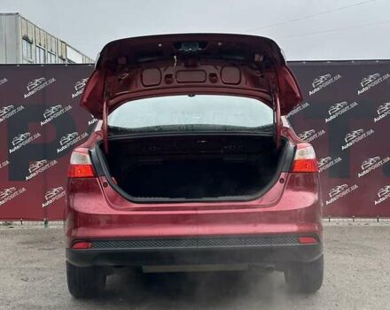 Красный Форд Фокус, объемом двигателя 2 л и пробегом 146 тыс. км за 8200 $, фото 10 на Automoto.ua