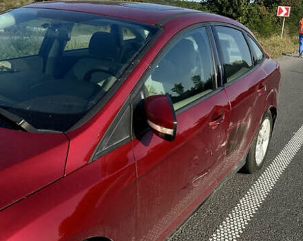 Красный Форд Фокус, объемом двигателя 2.01 л и пробегом 203 тыс. км за 6500 $, фото 2 на Automoto.ua