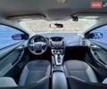 Красный Форд Фокус, объемом двигателя 2 л и пробегом 131 тыс. км за 7900 $, фото 10 на Automoto.ua