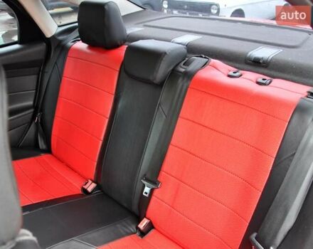 Червоний Форд Фокус, об'ємом двигуна 2 л та пробігом 207 тис. км за 6999 $, фото 21 на Automoto.ua