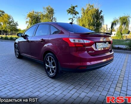 Червоний Форд Фокус, об'ємом двигуна 2 л та пробігом 204 тис. км за 7049 $, фото 1 на Automoto.ua